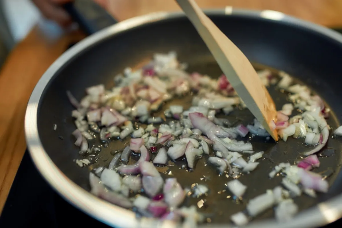 adding the onion and garlic